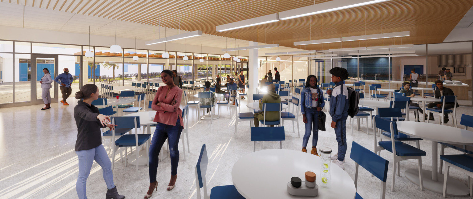 Cafeteria with wood slat ceiling detail with hanging light rods. More seating with pendant lights by floor to ceiling windows