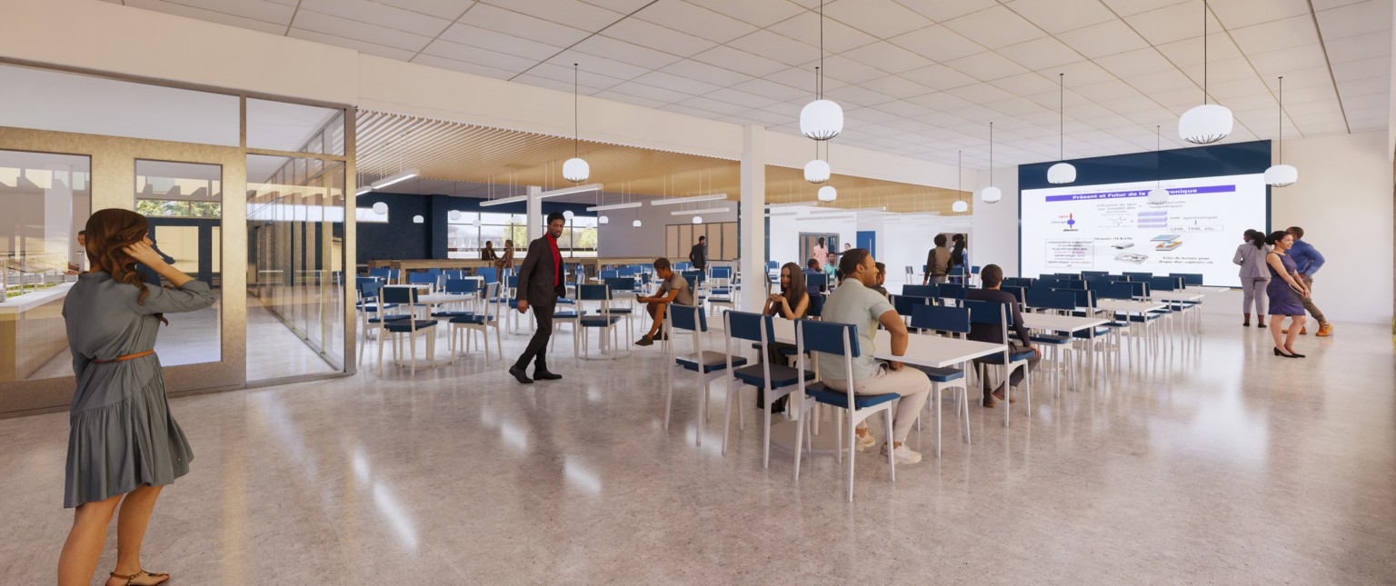 Open seating area with screen at front. White pendant lights hang overhead. Left, columns open into further seating space