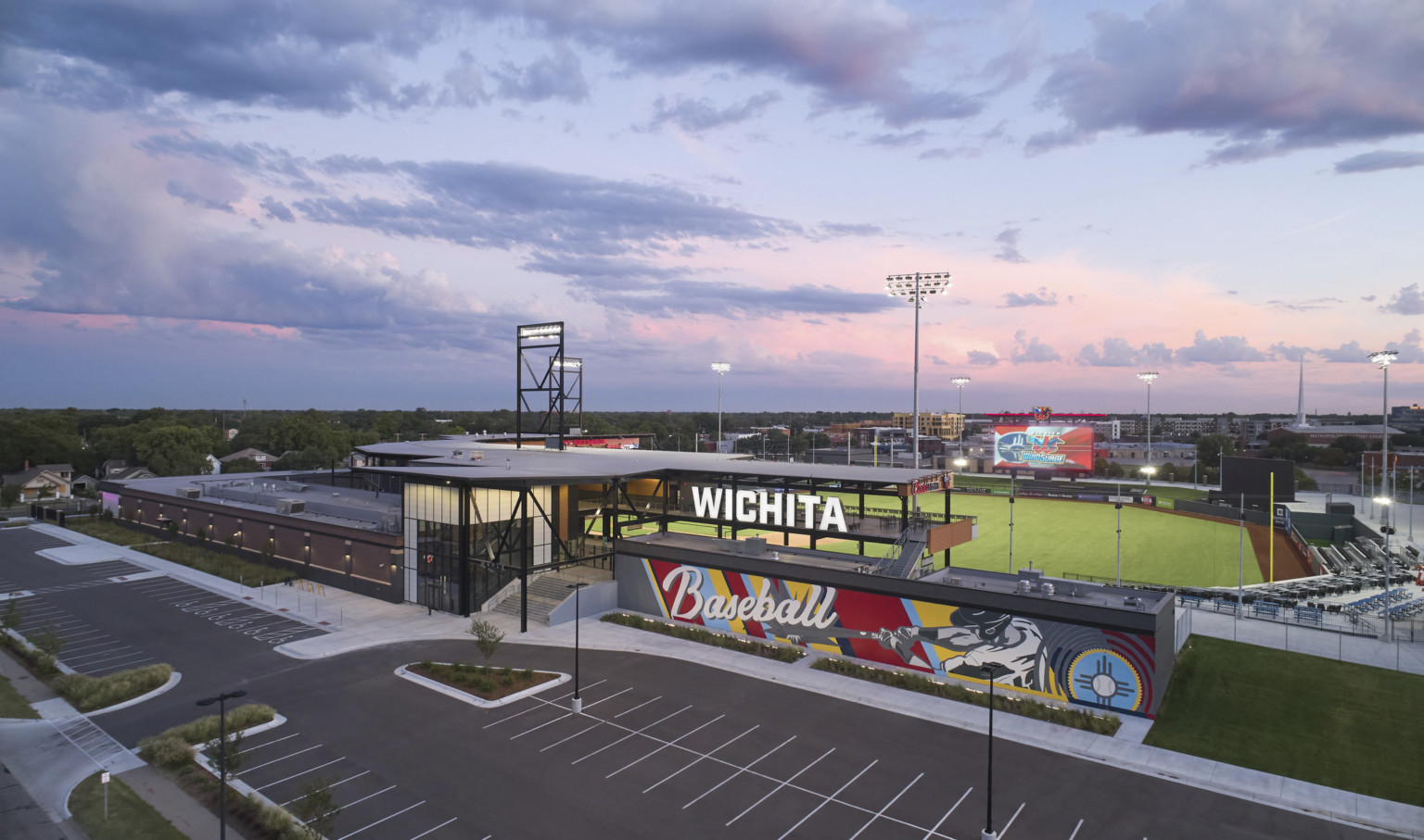 Aerial view of Riverfront Stadium seen from front entrance with colorful mural with white Wichita sign above