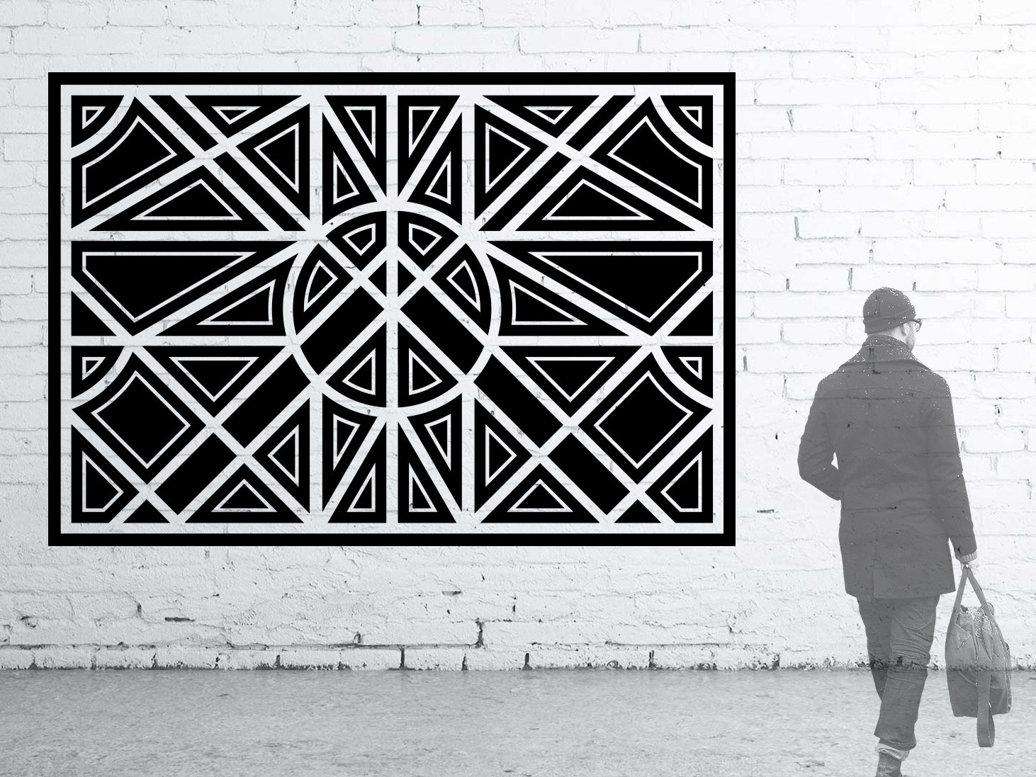 black geometric branding mural on white wall for riverpoint shopping center