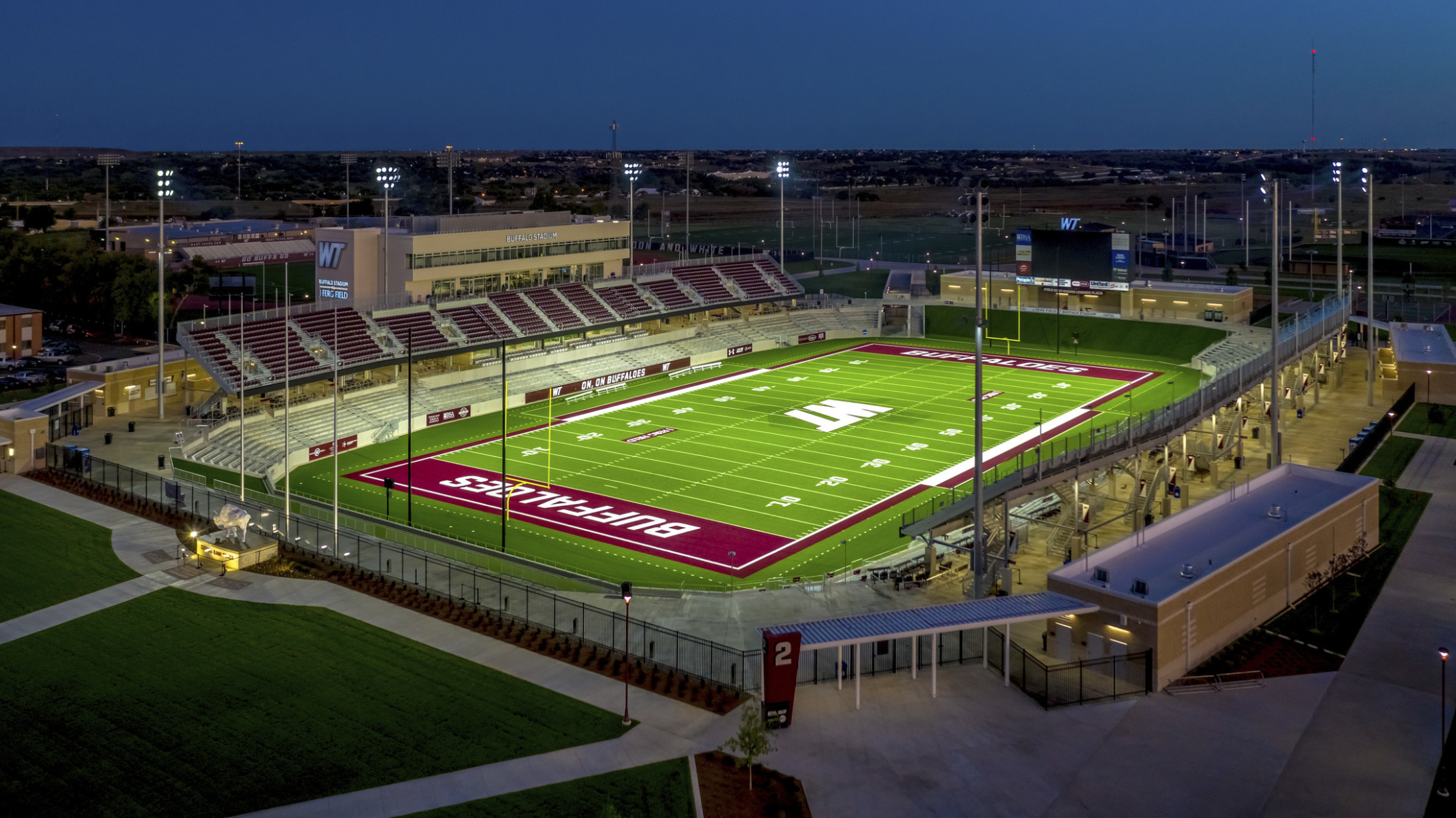 Buffalo Stadium at West Texas A&M aerial view rendering of the football field illuminated at night