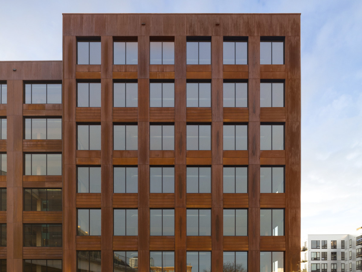 looking at the first mass timber T3 building in the US with warm exterior facade