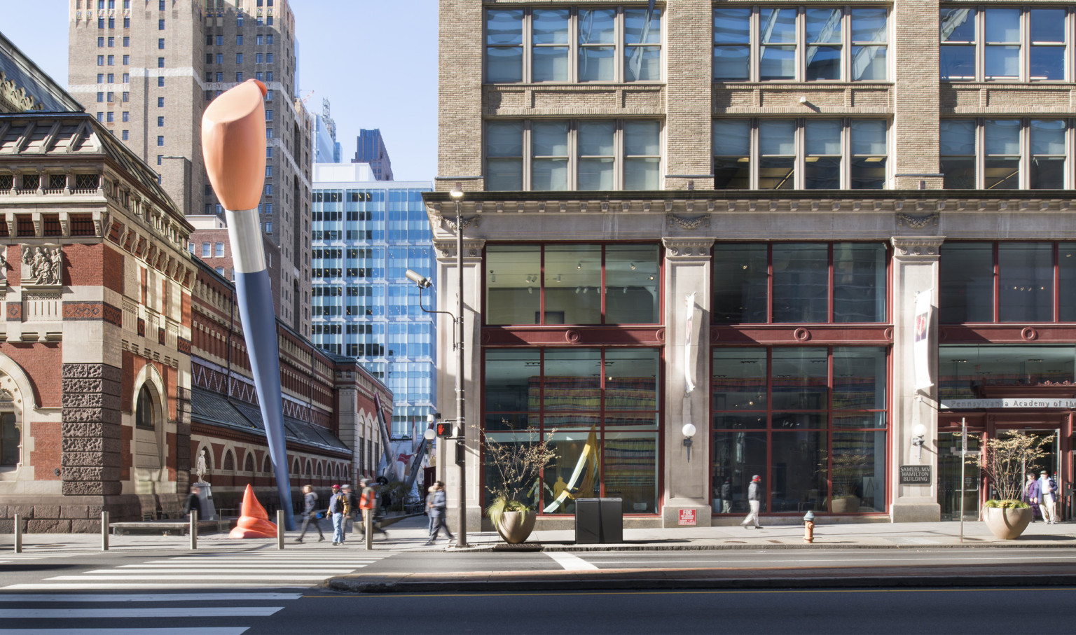 street view of Pennsylvania Academy of the Fine Arts building with two story blue and orange paint brush sculpture outside