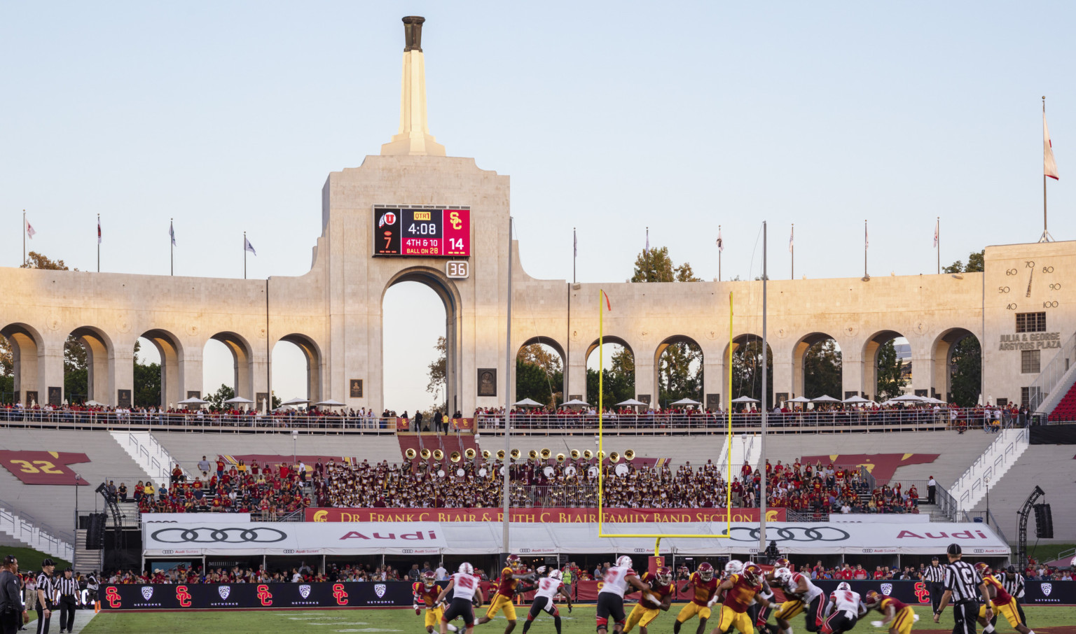 Entry concourse of Los Angeles Memorial Coliseum with central tower and Olympic Cauldron on top of a spire