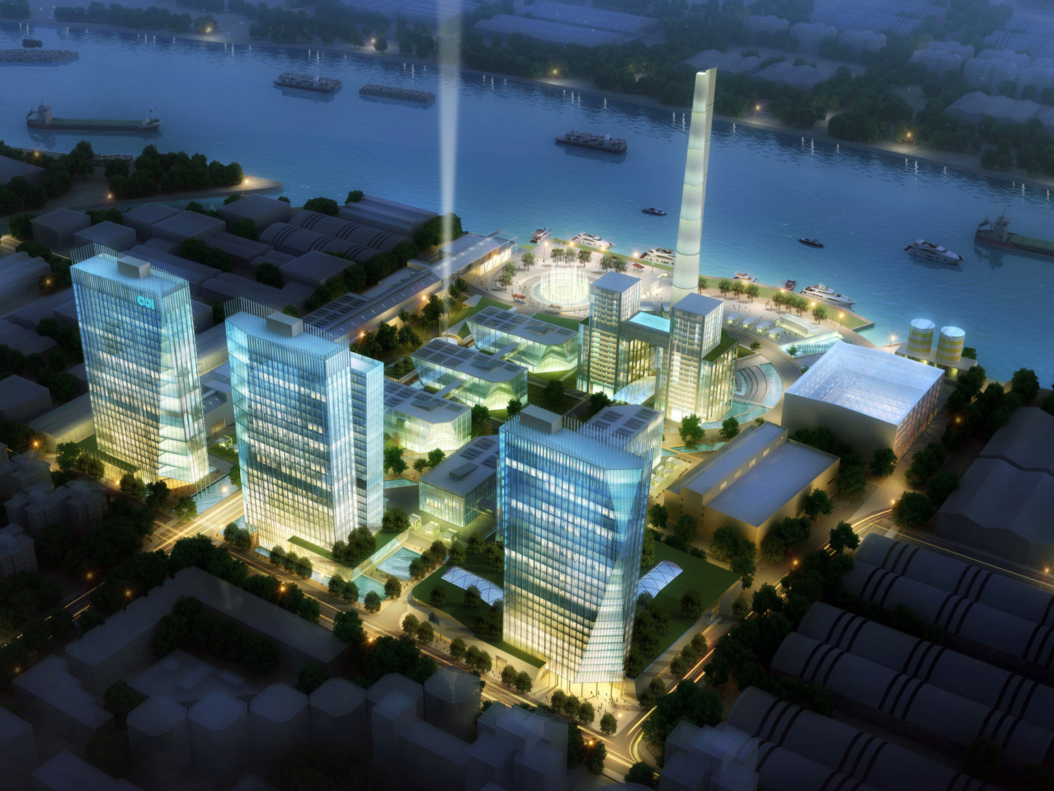 similar concept looking down at night to illuminated mixed-use buildings with glass facades on the bank of the Huangpu River