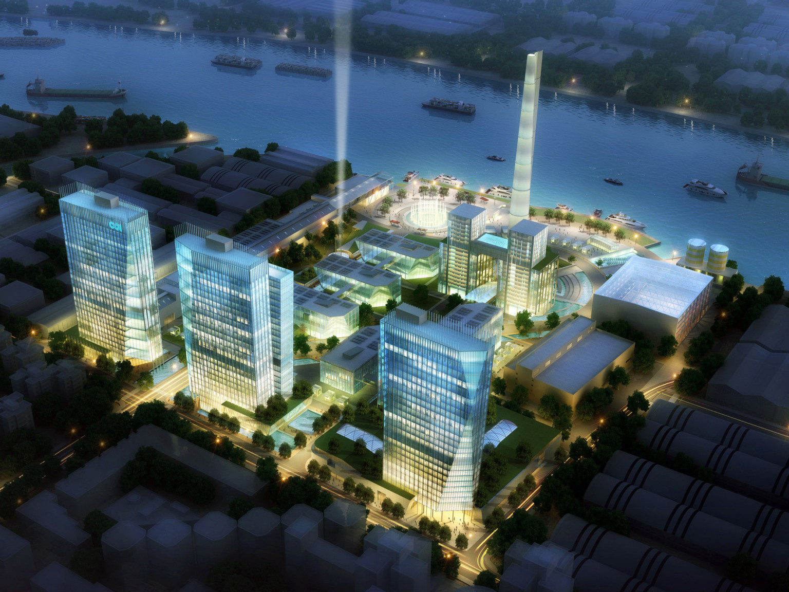 similar concept looking down at night to illuminated mixed-use buildings with glass facades on the bank of the Huangpu River