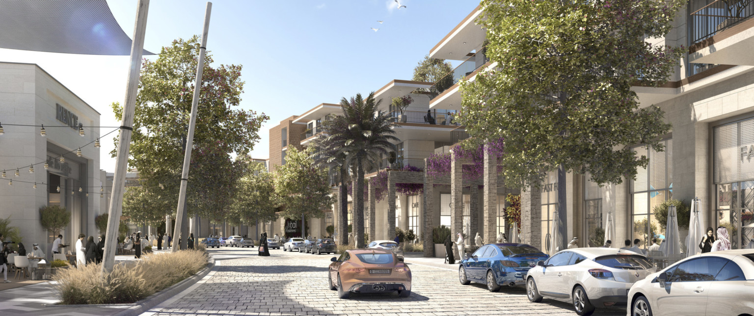 Street lined with trees and multistory storefronts with brown accents. Sunscreens, left, stone trellises with flowers right