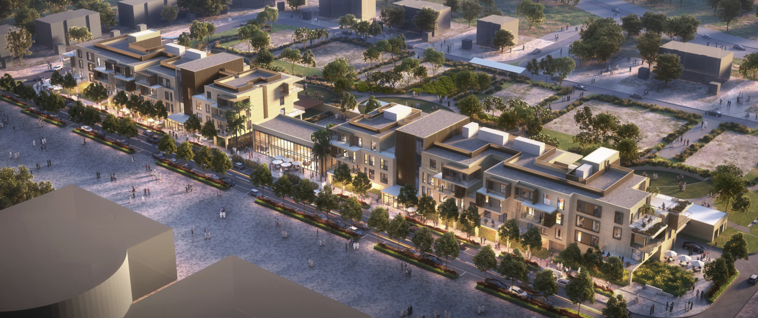 Pedestrian space in front of block long building with apartments. Double height central glass building. Courtyard garden back