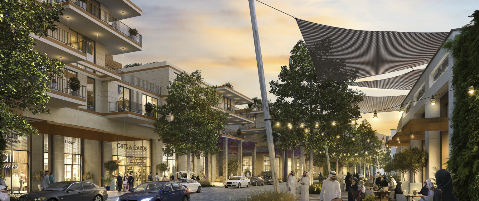 Multistory light color buildings with brown accents line curved road. Right, sunscreens drape from building with string light