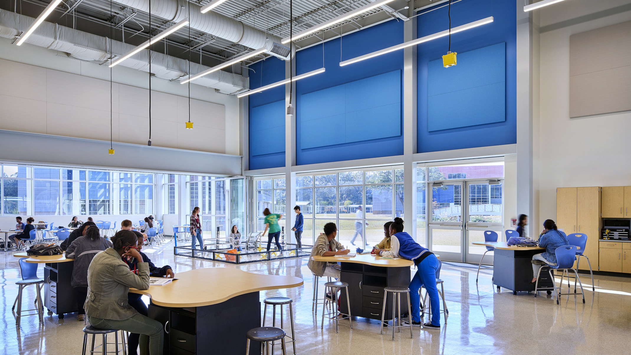 Large double height learning space in East Baton Rouge Liberty High School with drop power and a robotics ring for students