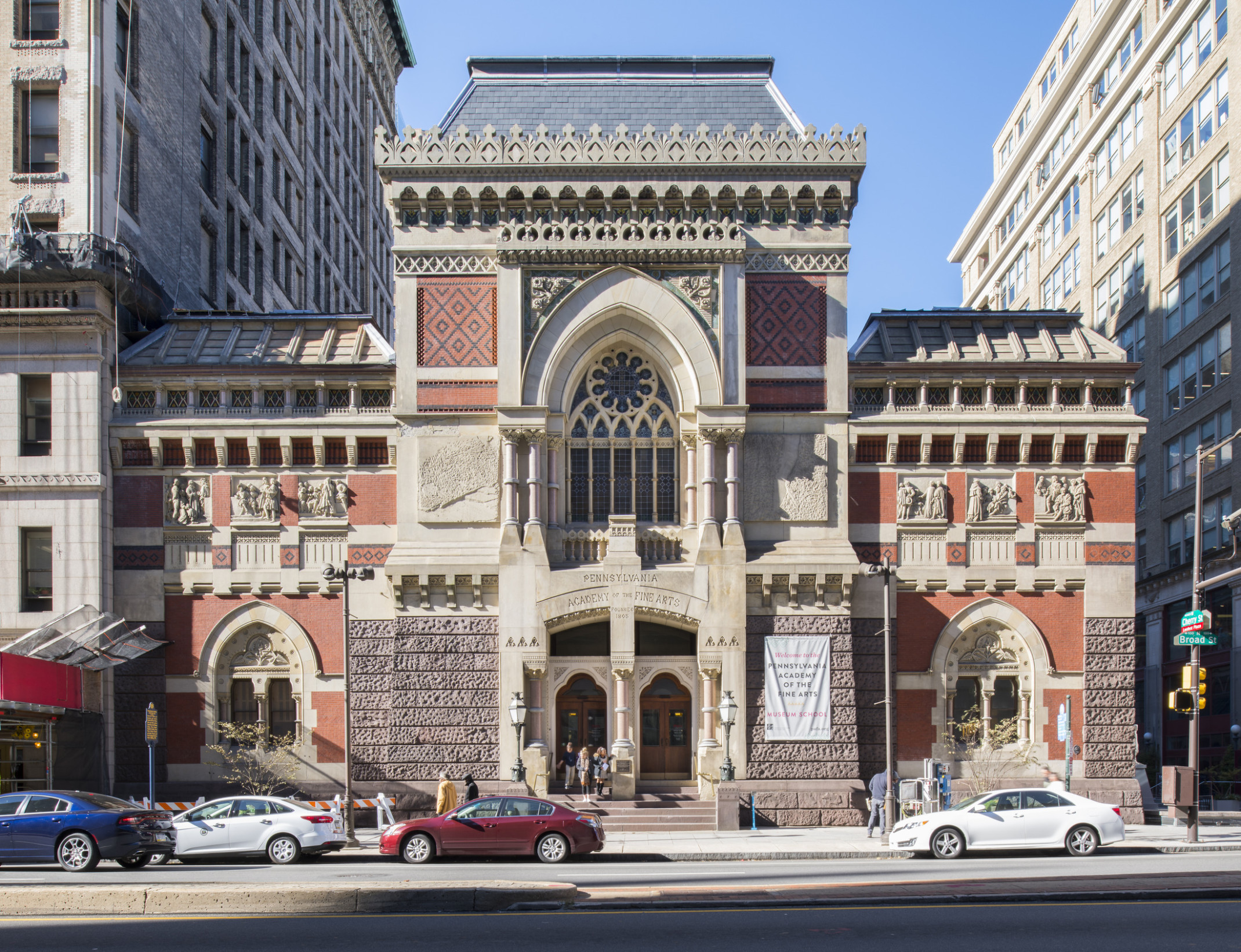 1876 Landmark Building Victorian architecture in America with arched windows and sculpted stone moldings and block facade