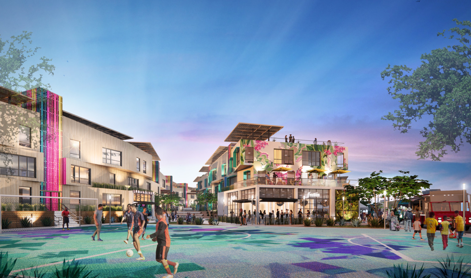 Community soccer field in front of 3 story mixed use buildings with store fronts, apartments, roof patios. Food trucks right