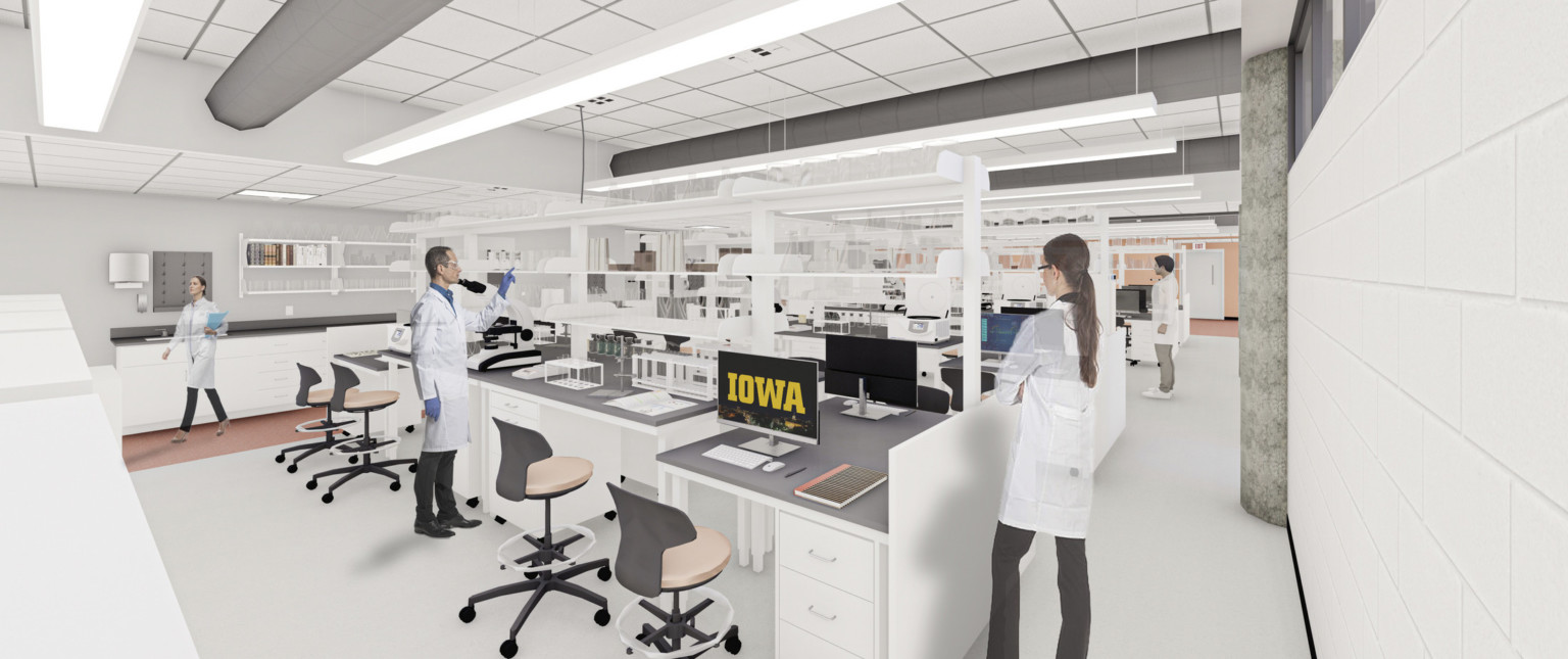 Rendering of science laboratory with white interior and grey workstation desks with chairs. computer screen saver reads Iowa