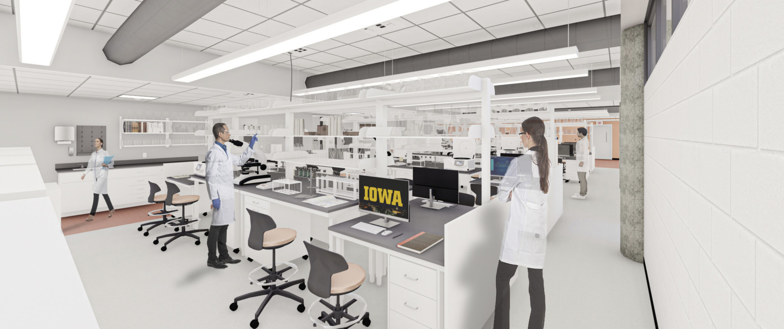 Rendering of science laboratory with white interior and grey workstation desks with chairs. computer screen saver reads Iowa Rendering of science laboratory with white interior and grey workstation desks with chairs. computer screen saver reads Iowa