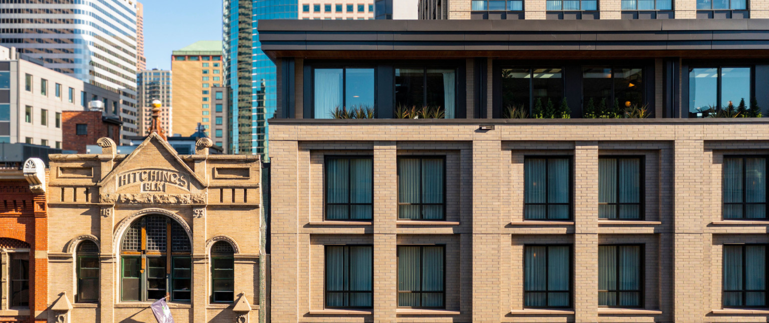 Detail of existing historical building blending into the Thompson Hotel Denver facade