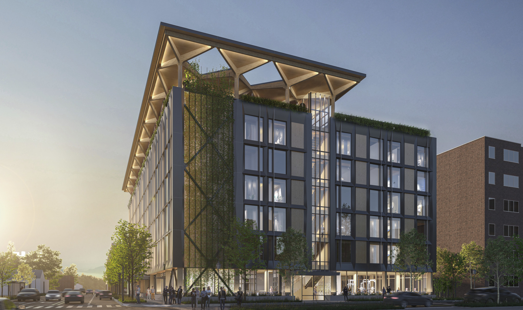 A mass timber midrise hotel with a blackened steel façade and timber infill with an arched timber canopy on a glassed-in rooftop