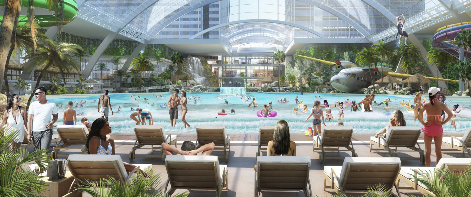 Rendering of waterpark interior. Lounge chairs sit in front of pool surrounded by plants with zipline and skylight overhead