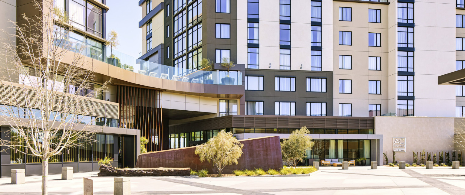 Exterior detail view of connection point between two hotels.