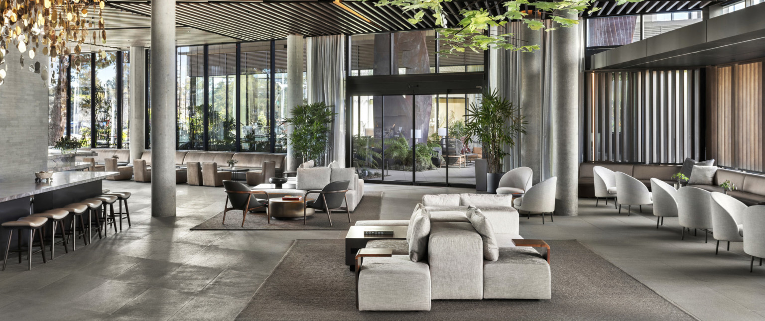 Floor-to-ceiling window allow daylight to wash the interior lobby and creates connection points to the central breezeway, blurring the lines between the inside out.