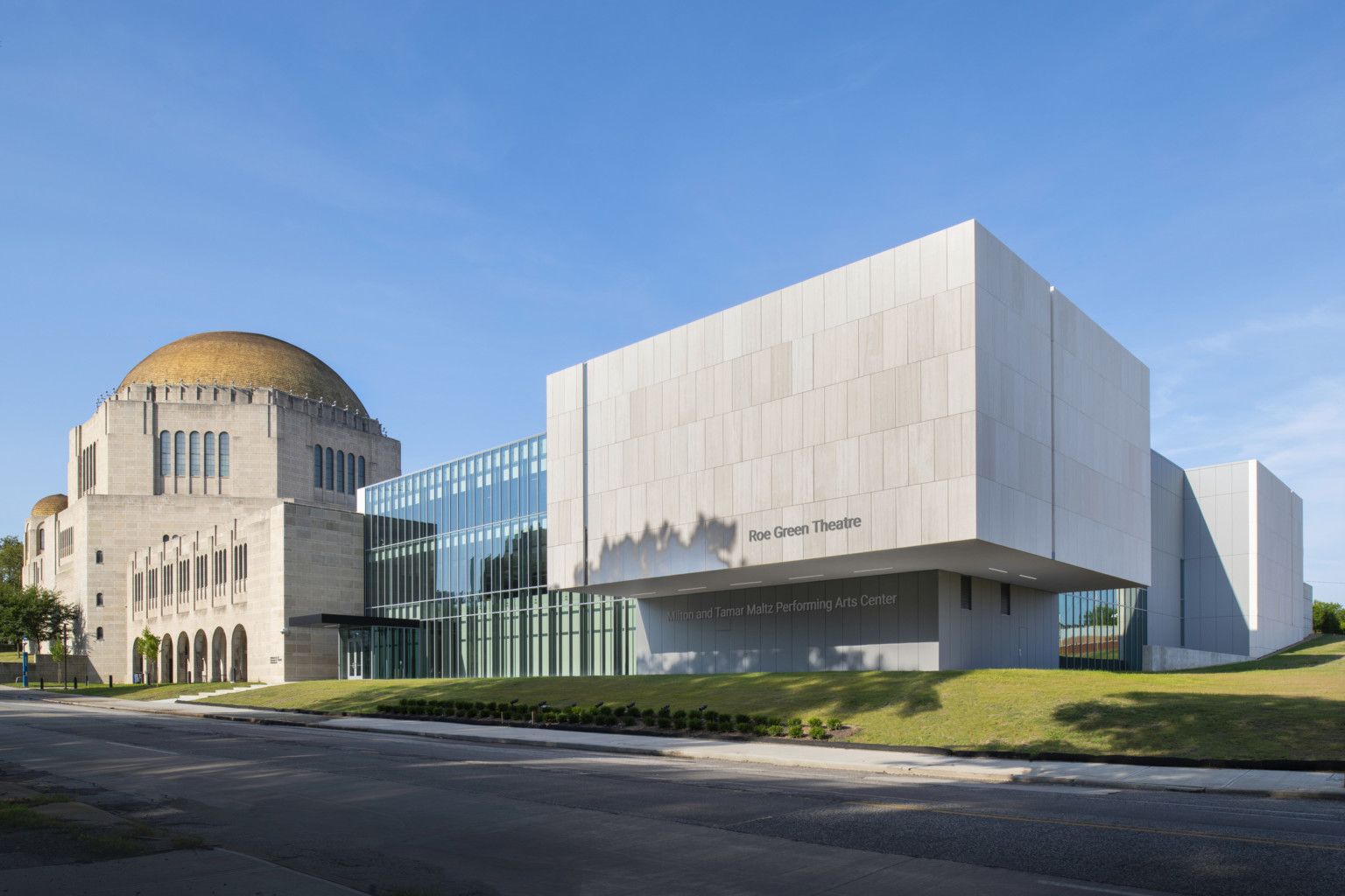 Front entrance of concrete and glass geometric addition to the historic dome temple at Case Western Reserve University