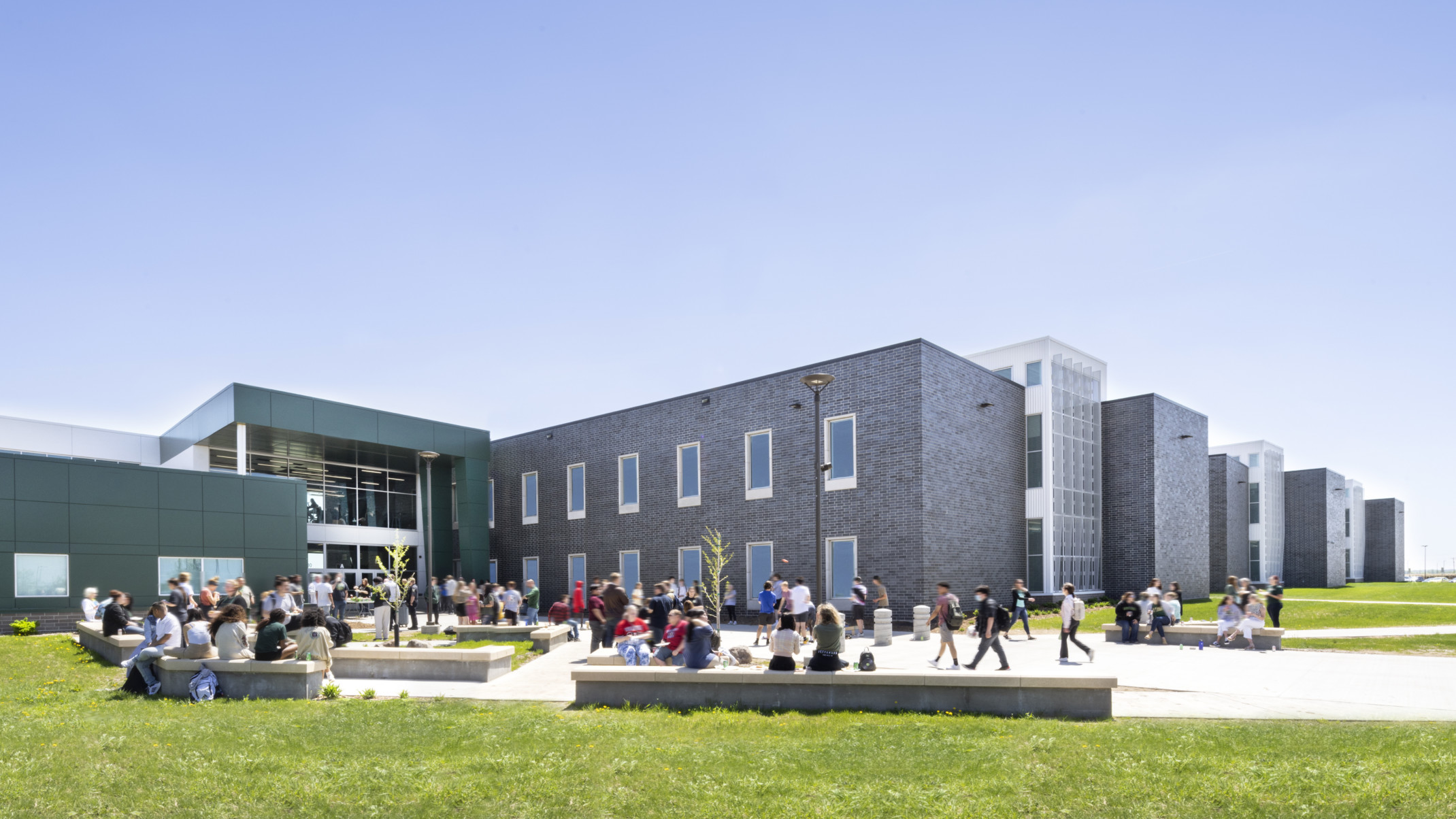 Exterior courtyard of Sioux Falls' Jefferson High School with wrapped facade square entry