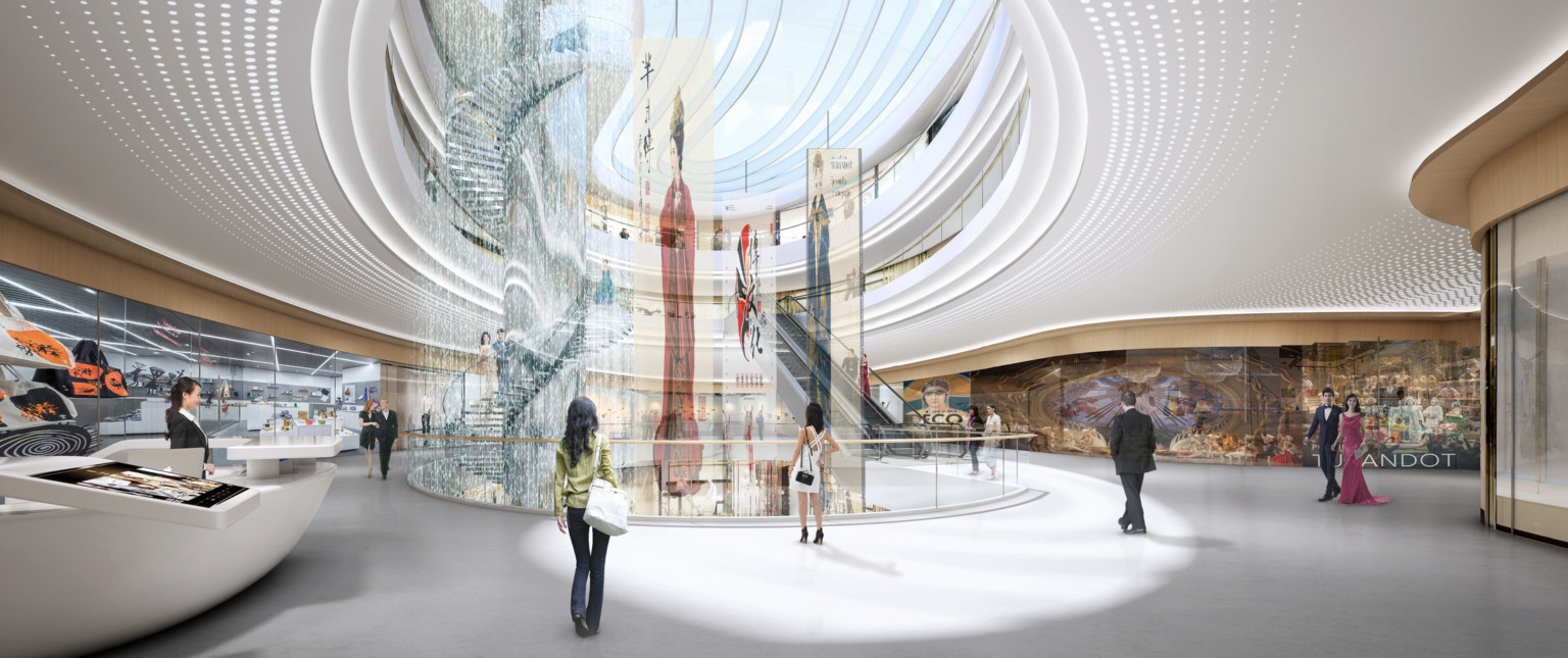 Interior with rounded skylight and items hanging in cutout within floor and floor to ceiling displays, modern display counters