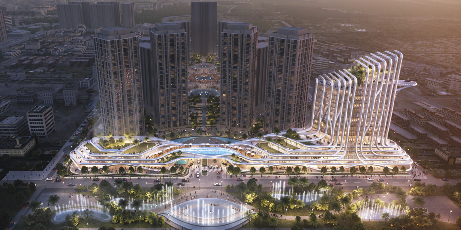 architecture rendering a large mixed-use development planned for Baghdad; a large water feature splits the building structure in half, with a high rise building designed for the east side