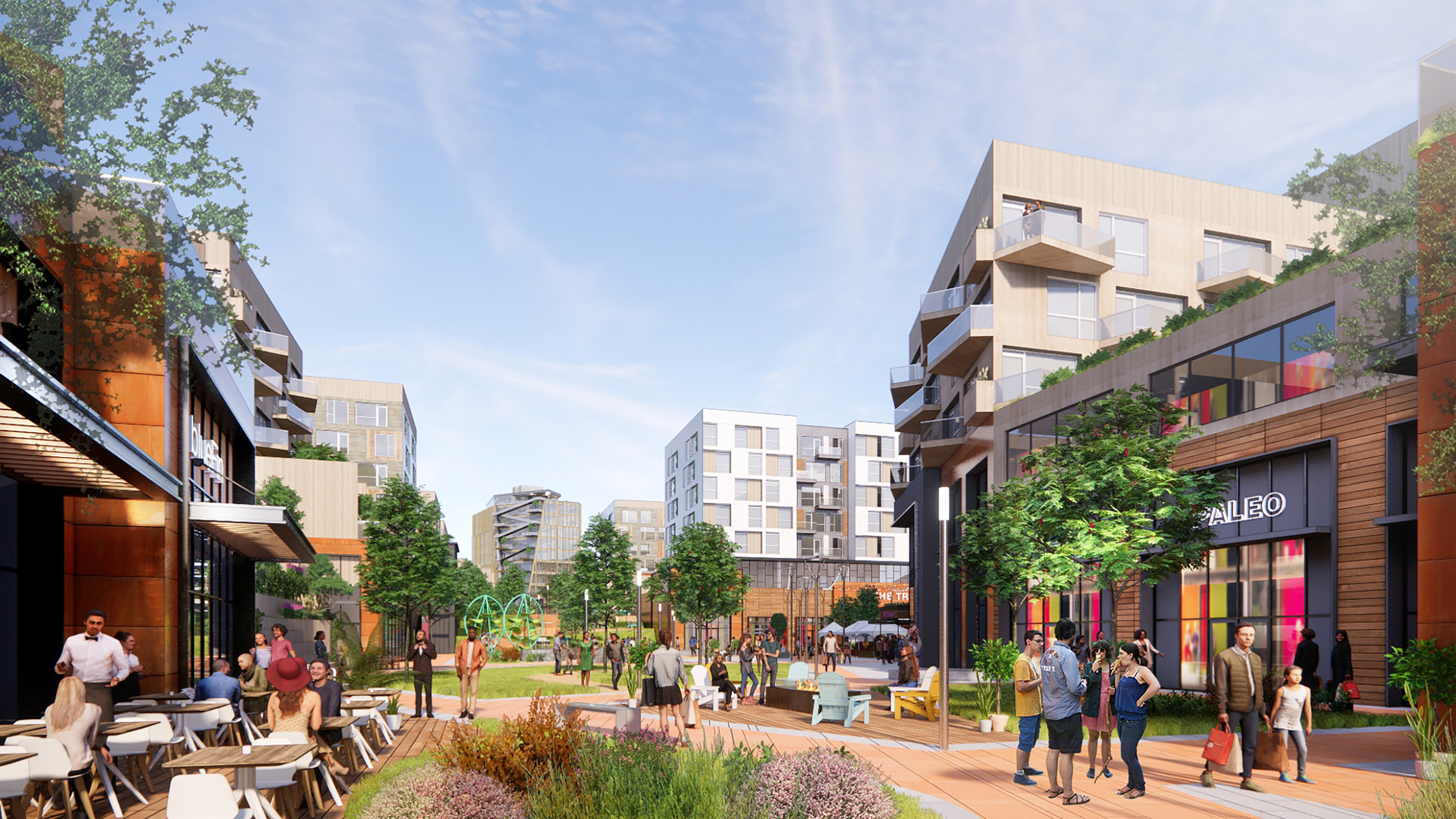 Outdoor shopping mall renovated into walkable mixed-use space with shopping, dining, community seating areas, and green space