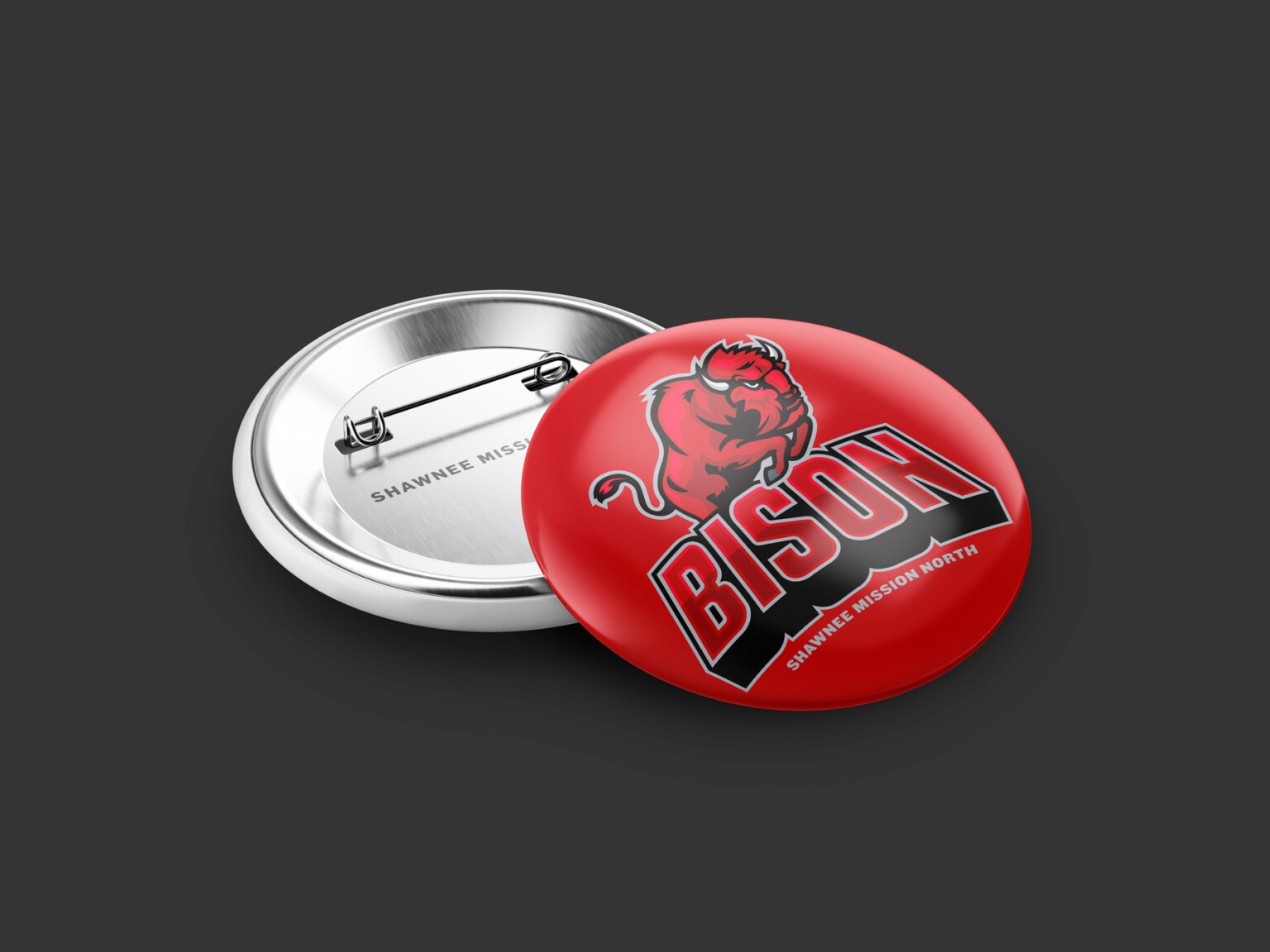 Red button pin with logo and Bison written across the bottom