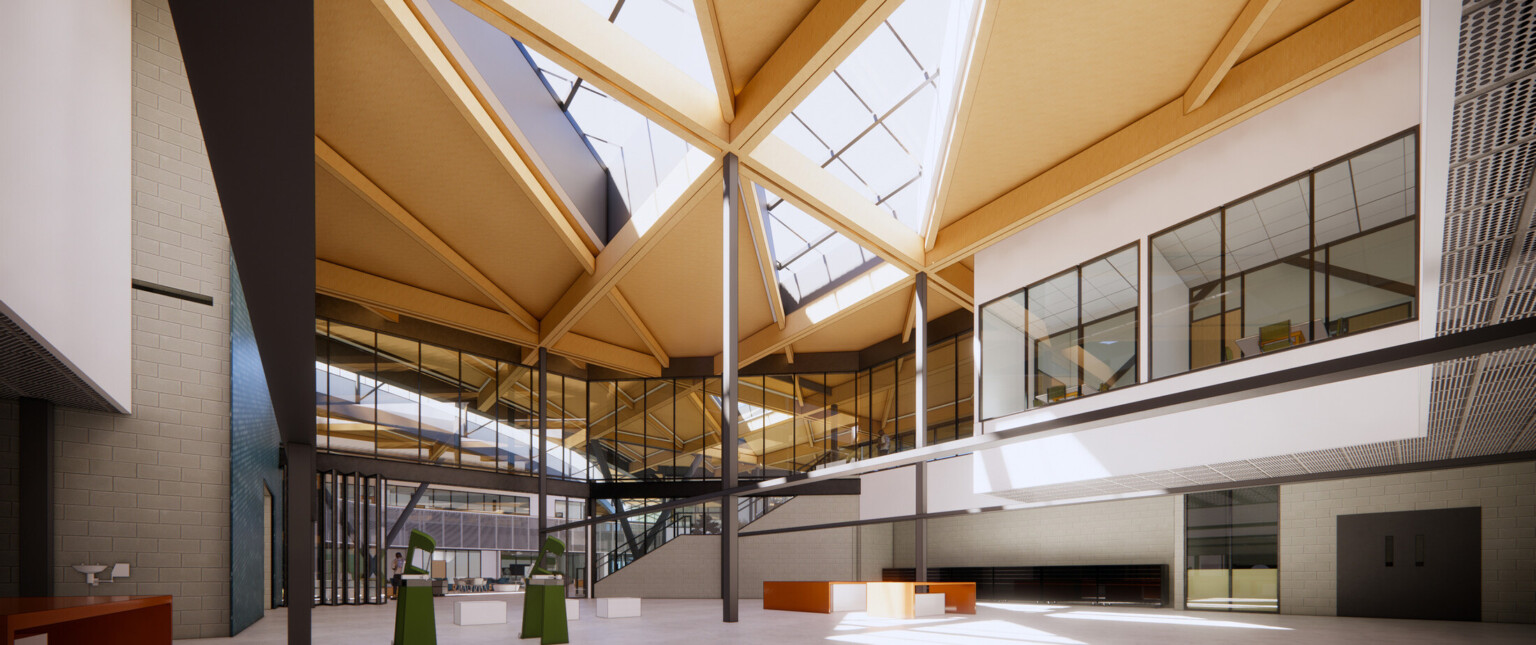 glass enclosed mezzanine over open reception area space with exposed black steel framing and angular skylights wood ceiling