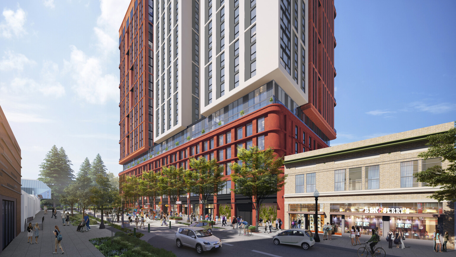 The HUB at Berkley, a mixed use higher education facility. Multistory tall building in brown and white with large windows