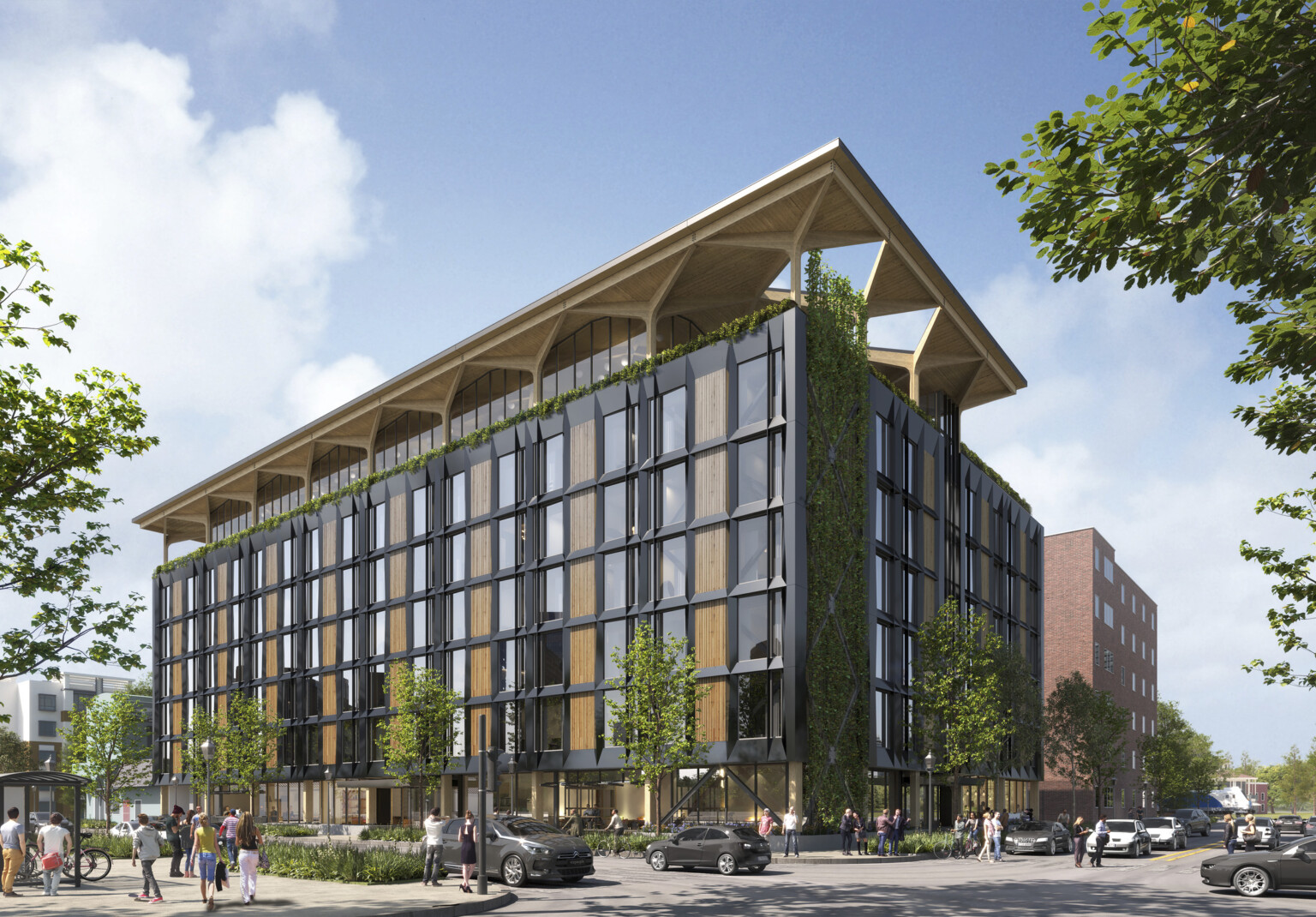 a midrise building with blackened steel facade and timber infill with an arched timber canopy on a glassed in rooftop