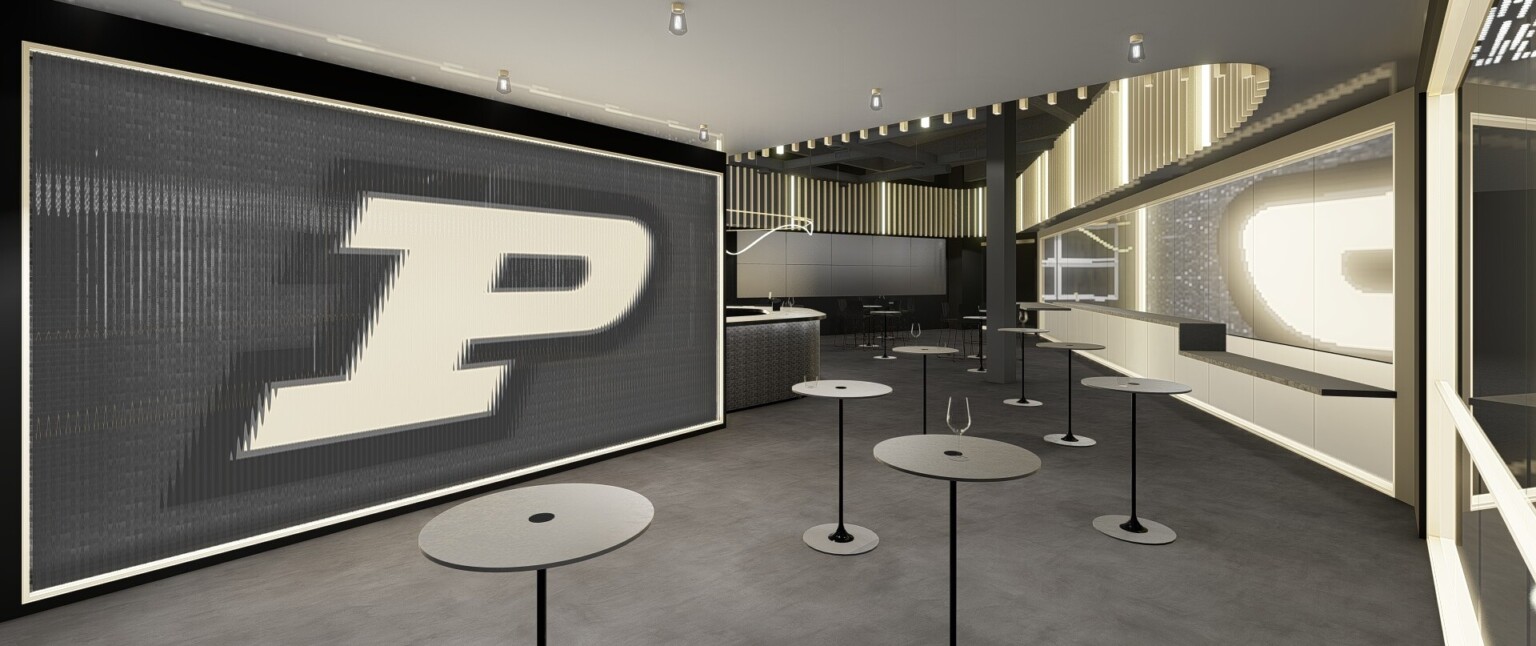 John Wooden Club at Mackey Arena, standing height round tables in room with Purdue P logo on wall