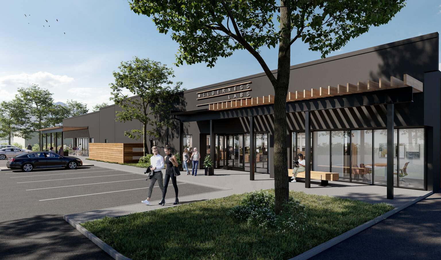 External rendering of future life science tenant space with wood panel canopy surrounded by trees.