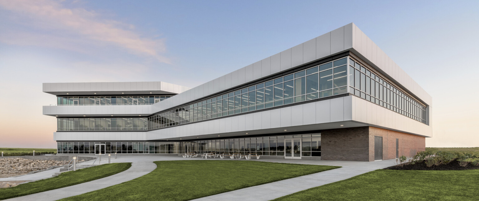 Exterior space on the lake facing side of the building with walking trails and access to the lake beach and water