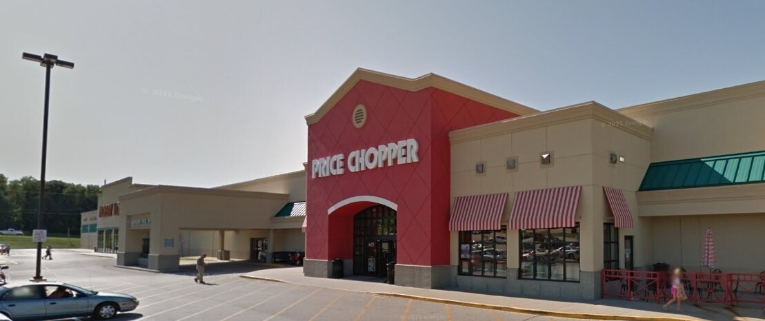 The location of NKC ECC prior to opening. An abandoned grocery store. Dark red building with pointed center facade