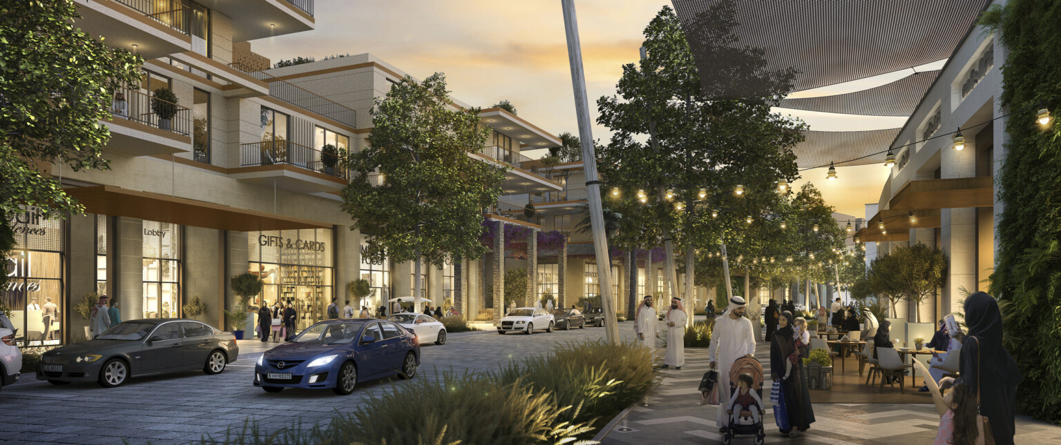 Multistory light color buildings with brown accents line curved road. Right, sunscreens drape from building with string light