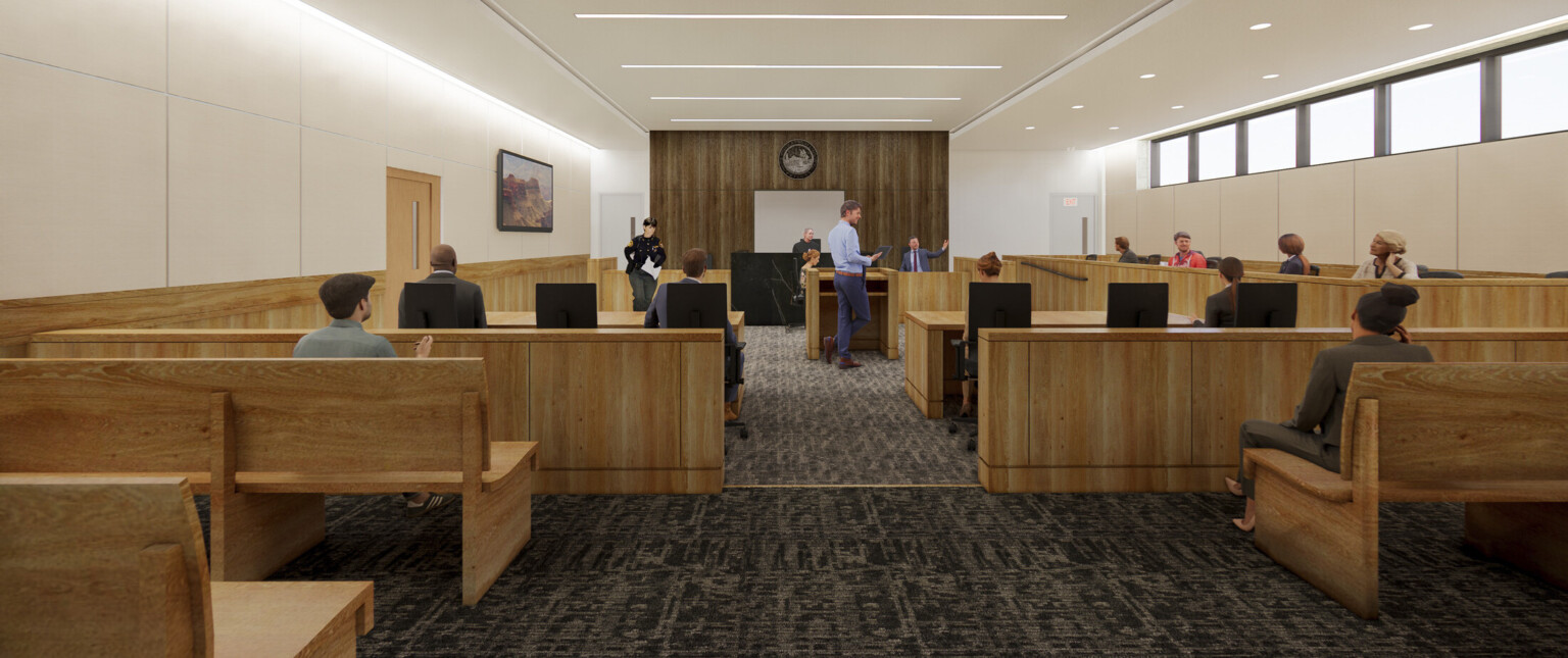 Yavapai County Criminal Justice Center courtroom with natural wood seating