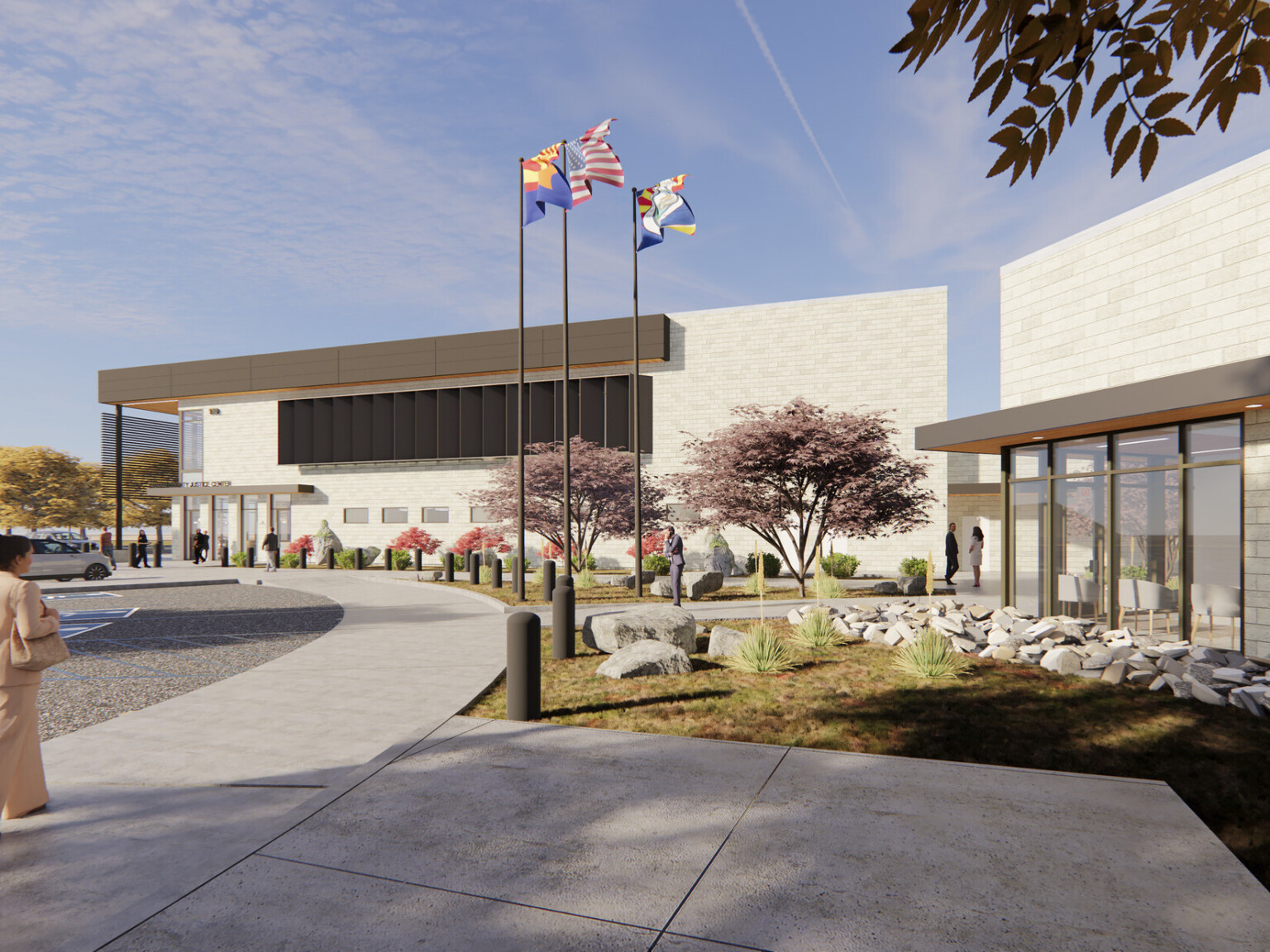 Yavapai County Criminal Justice Center exterior building entrance with flags