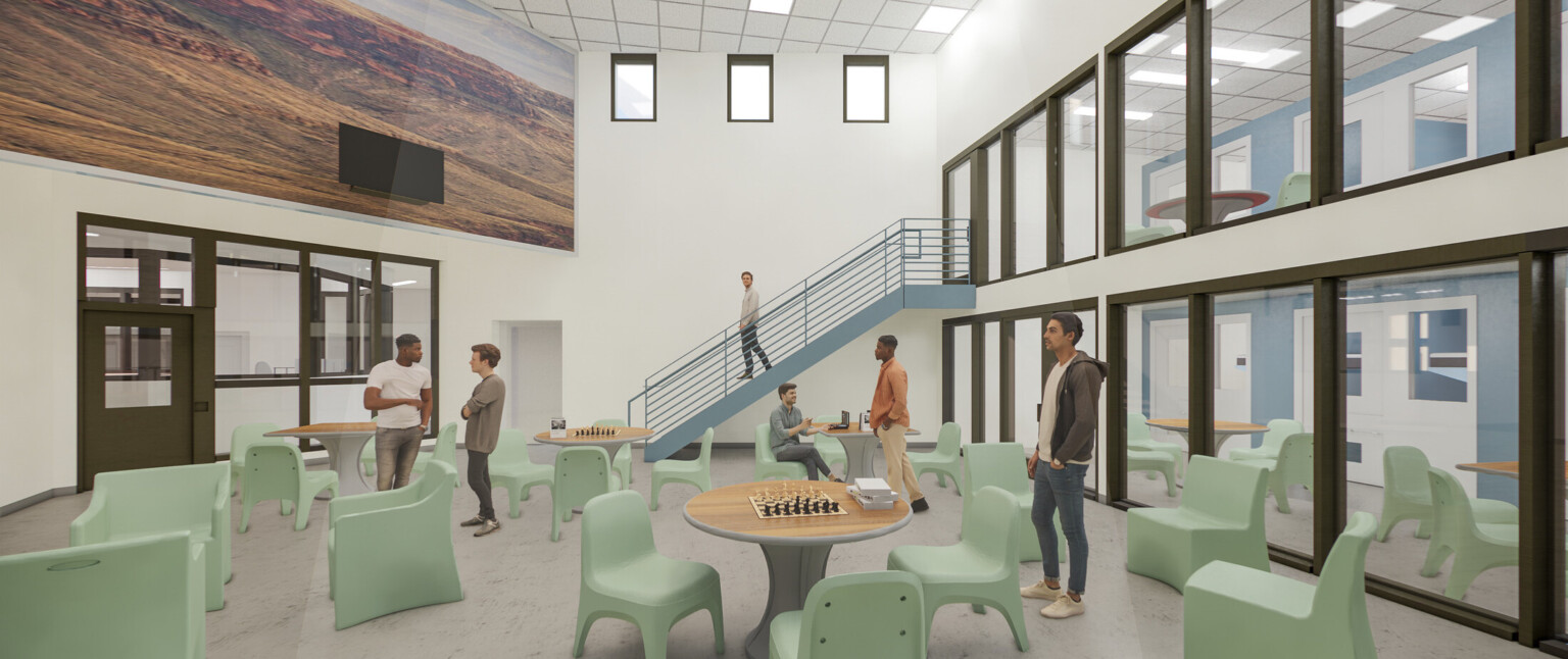 Yavapai County Criminal Justice Center with open concept work meeting areas with modular chairs and desks