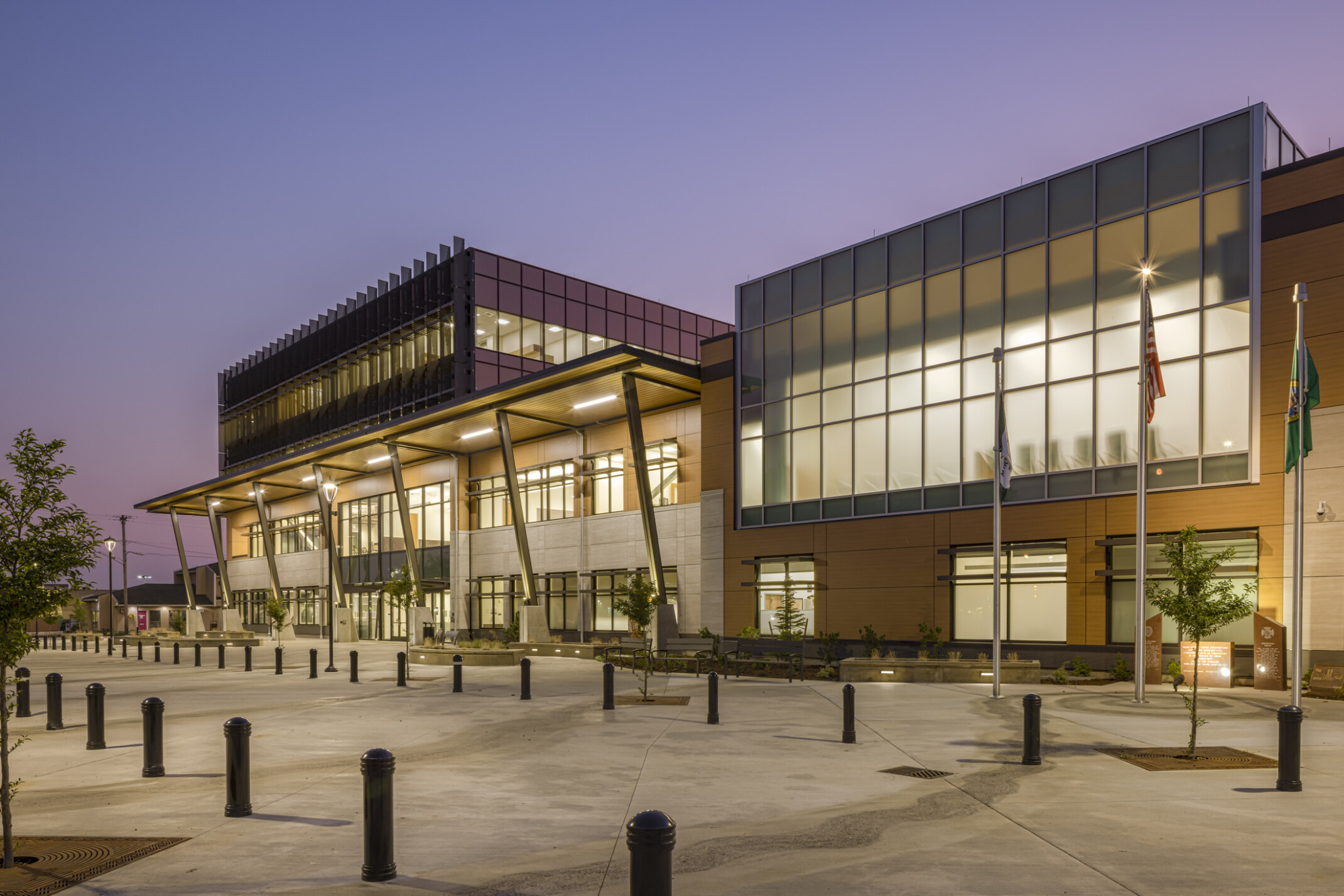 The main entrance in the four-story central tower of Marysville Civic Campus welcomes residents and visitors, sets a new architectural standard for the city and engages with an adjacent city park, main entrance in the four-story central tower, and employs floor-to-ceiling privacy windows on the upper level