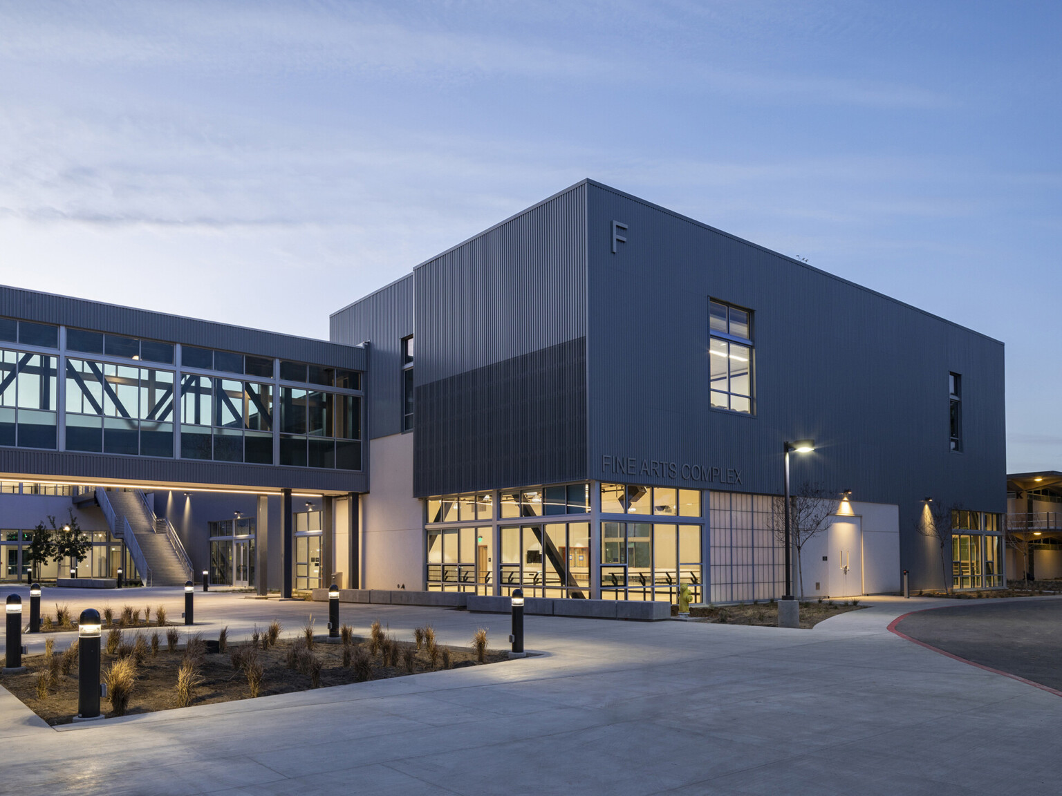 Exterior of Allan Hancock College Fine Arts Complex with glass and panel facade