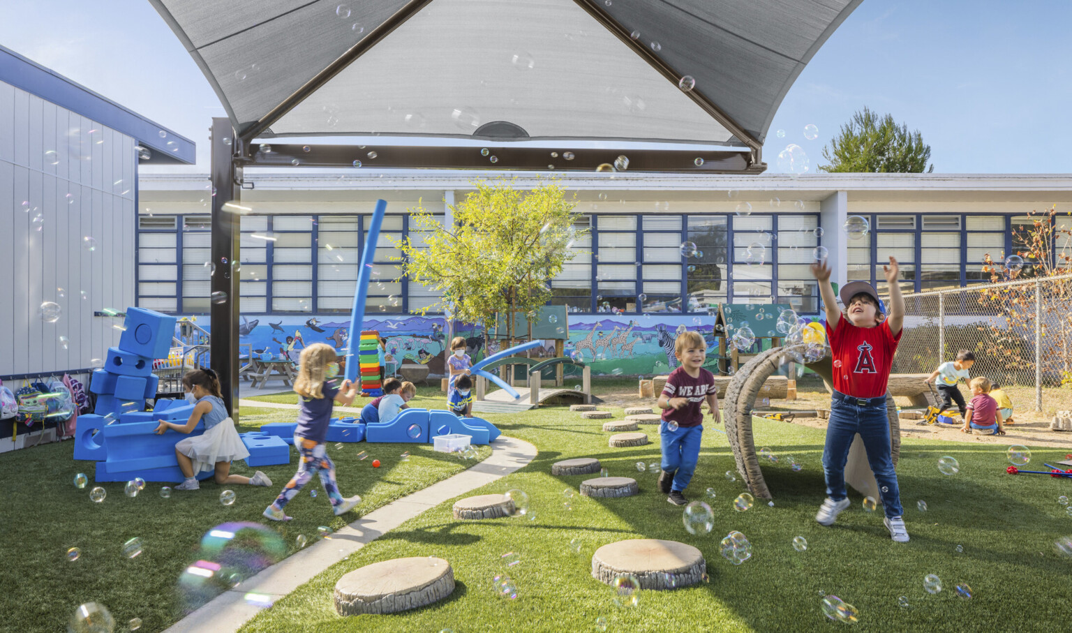 Children on a playground specially designed to accomodate children with sensory issues