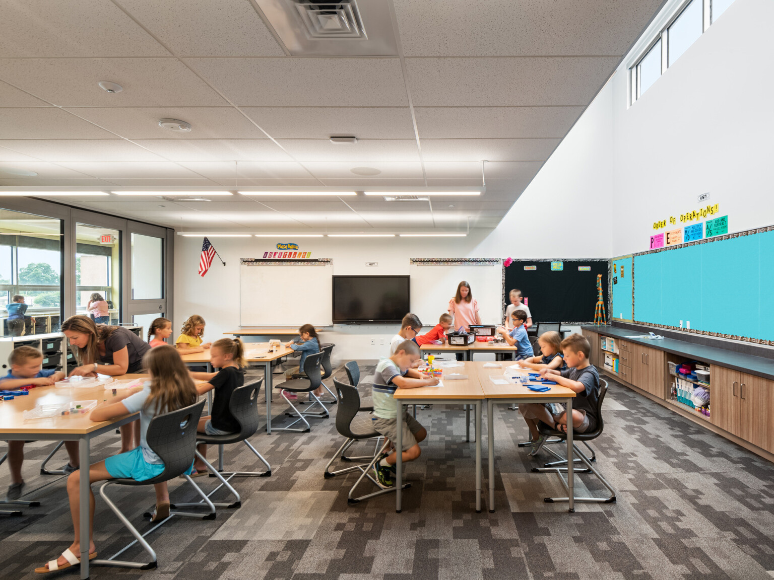 classroom with flexible furniture and wall closed, clerestory window for natural light