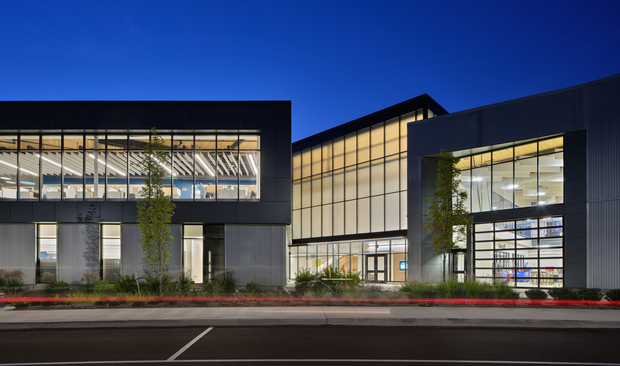 Kalamazoo RESA career technical education building featuring exposed wood structure, natural materials, and biophilic design elements