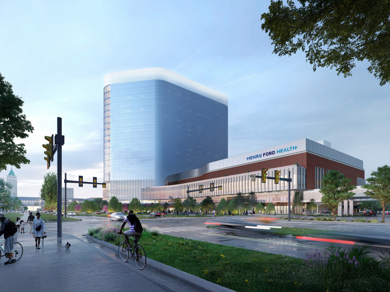A render of a modern red brick and glass building with a curved design, large windows, and vertical fins. Rendering Courtesy of HDR