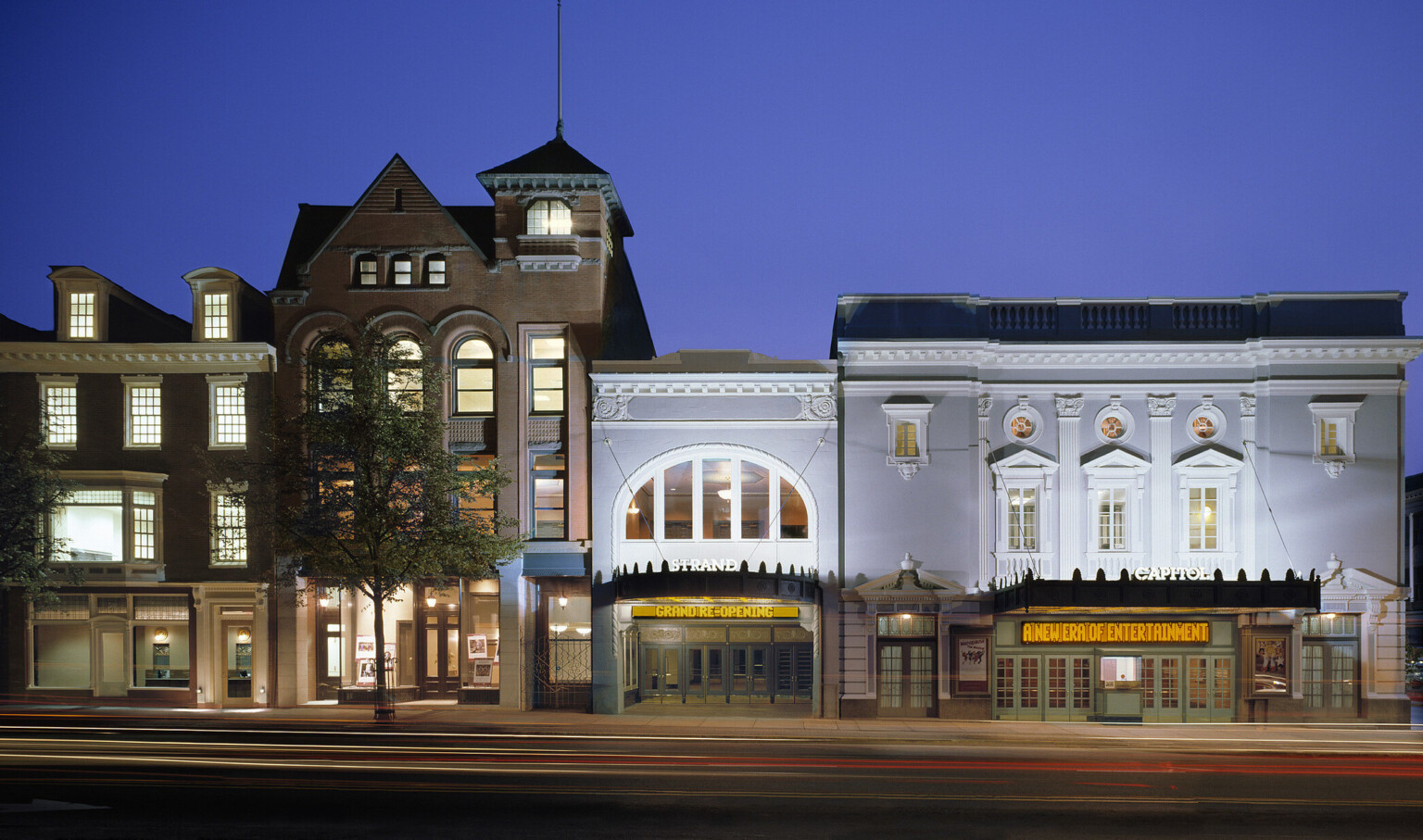 Appell Center for the Performing Arts multi building complex. Right, Capitol Theater and Strand, light building with moulding