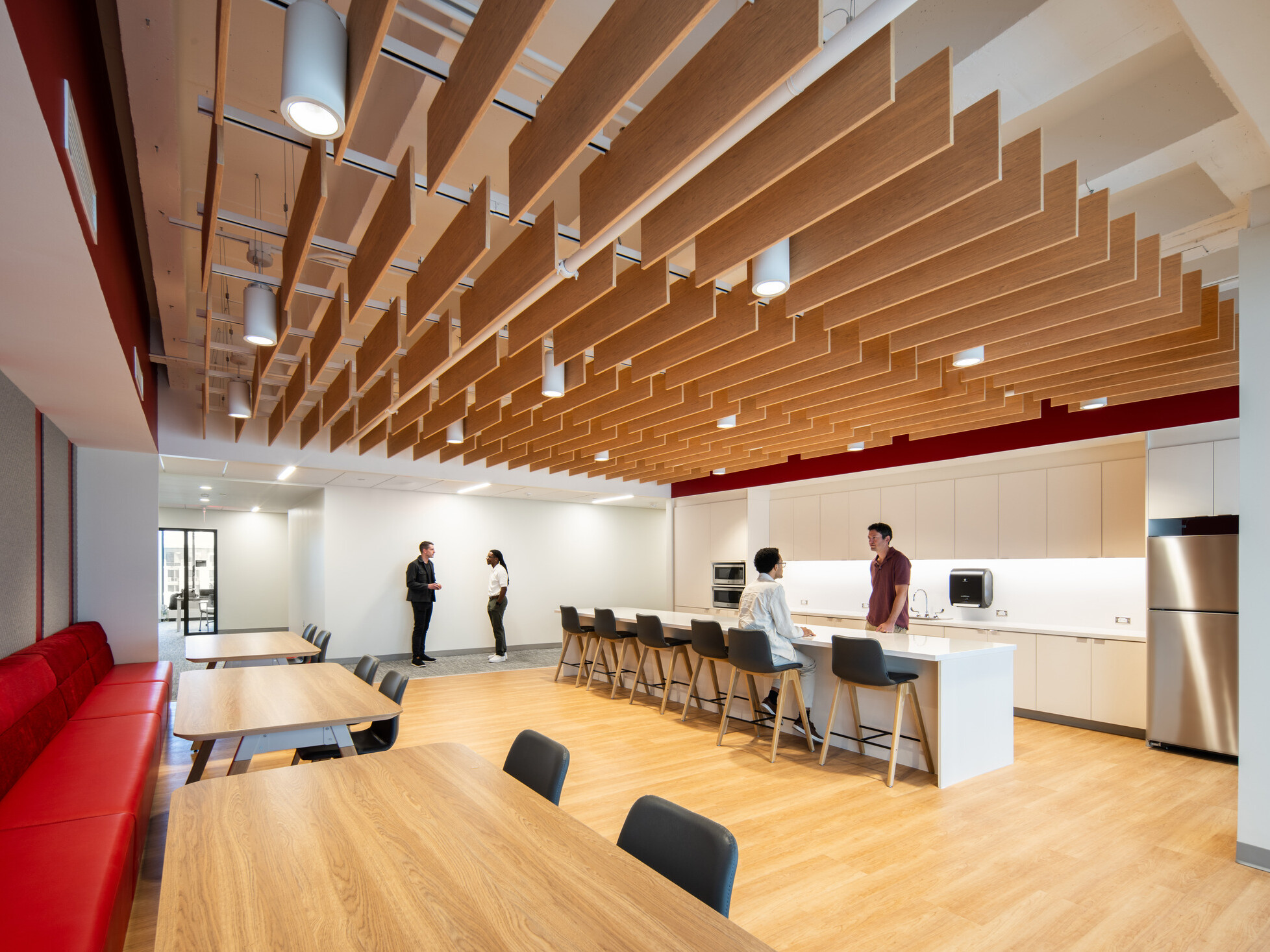 modern community space in a science building; bar seating space in communal kitchen