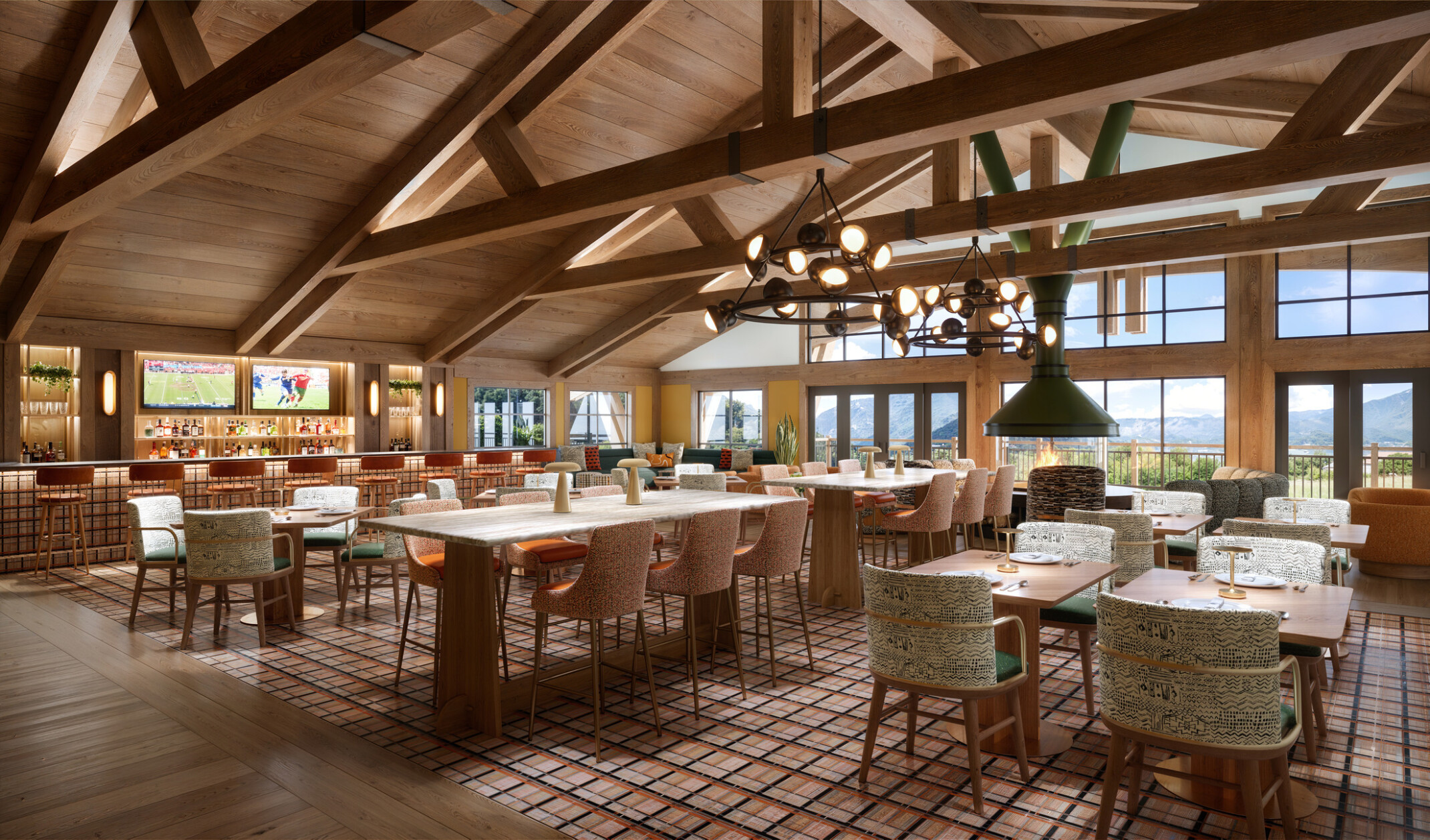 Canopy by Hilton, Park City, Utah dining room; timber and wood design throughout the space with vaulted ceilings and wood beams; cozy country style tables overlook a wall of windows to the mountain view; bar to the far left wall of the space with sports on the TVs