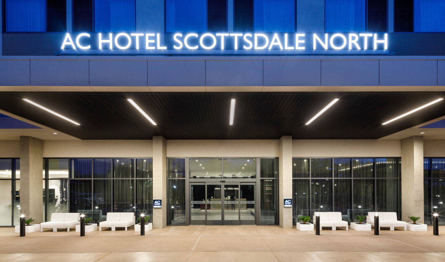entry to the AC Hotel Scottsdale North with blue neon lights